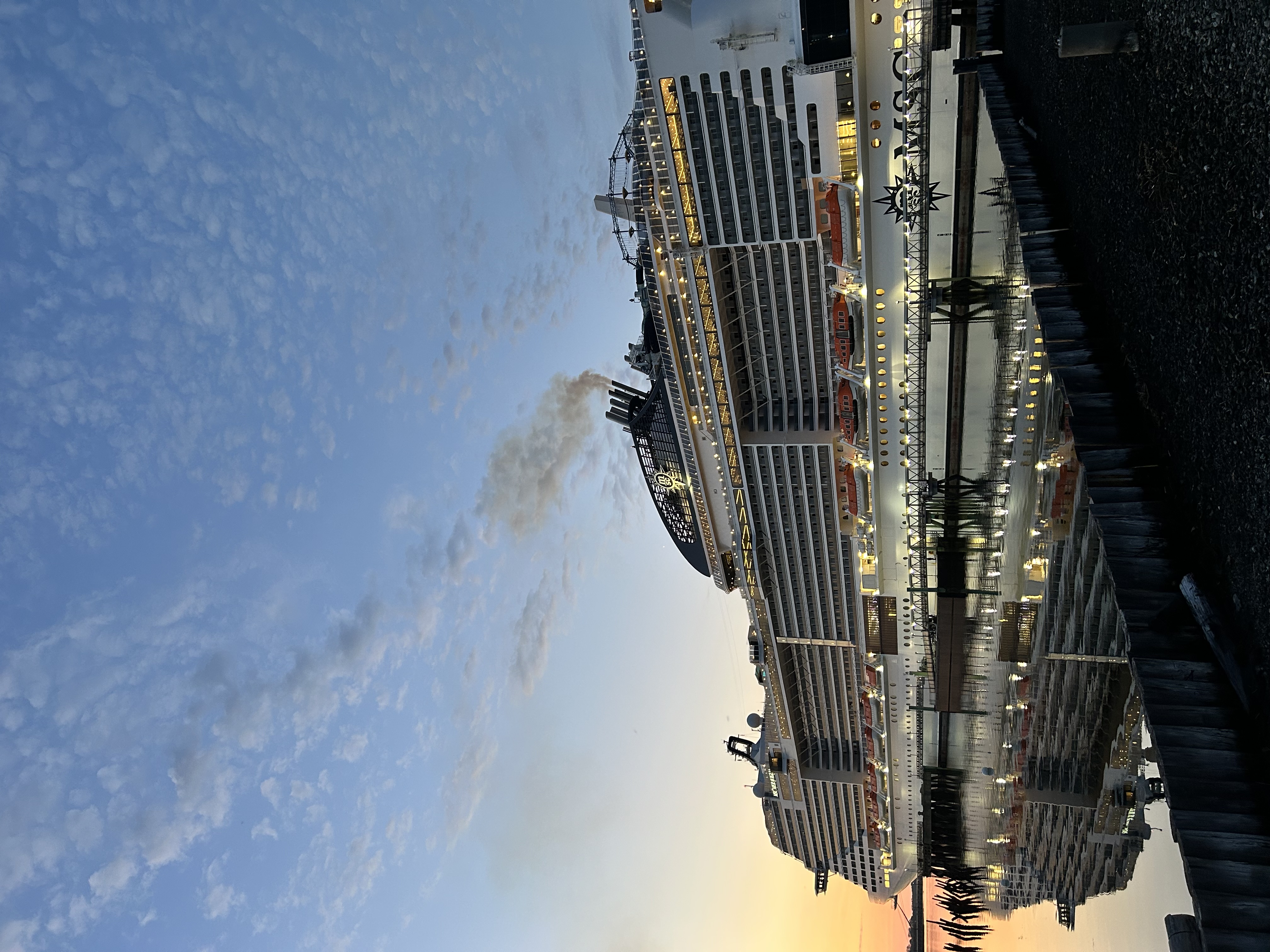 Cruise ship with visible pollution from scrubbers